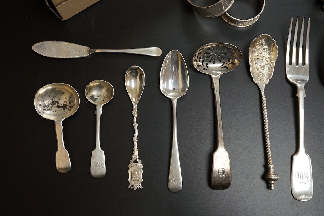 A quantity of assorted mainly 19th century flatware, various patterns, dates and makers including a set of six George III fiddle pattern table spoons by Eley, Fearn & Chawner, London, 1809, six silver fiddle pattern tabl